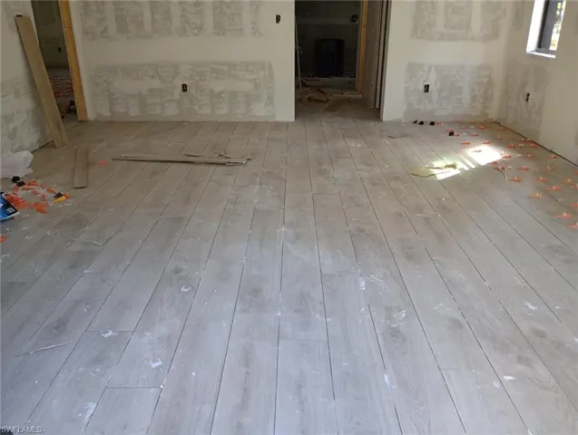 Unfurnished room featuring light wood-type flooring
