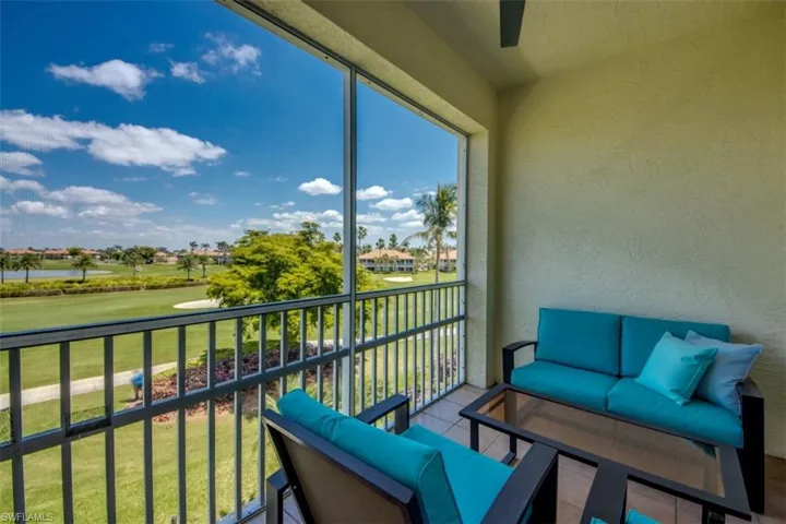 Balcony with outdoor lounge area and golf course view