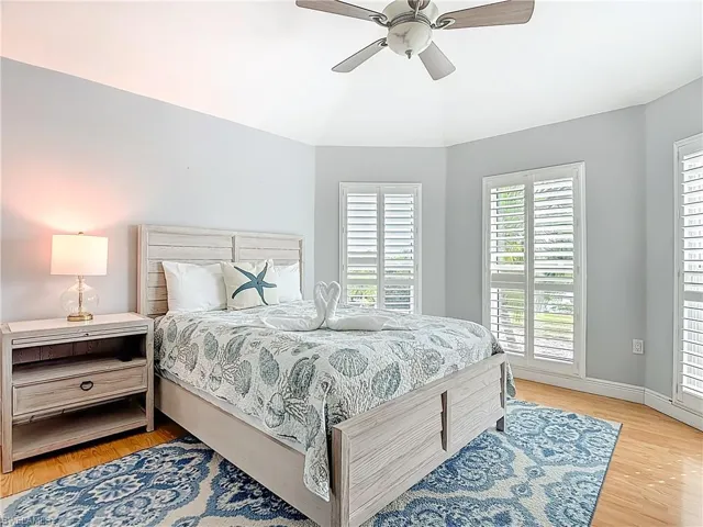 Bedroom featuring light wood-type flooring and ceiling fan