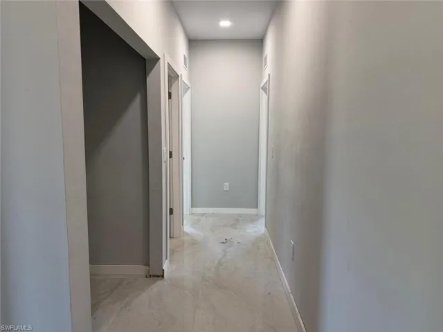 Hallway with baseboards