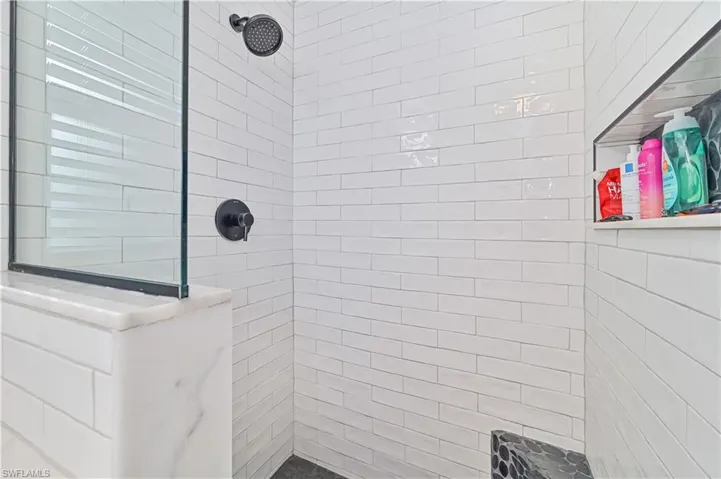 Bathroom with tiled shower