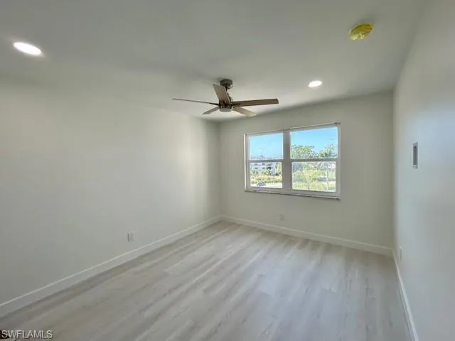Bedroom with hurricane windows