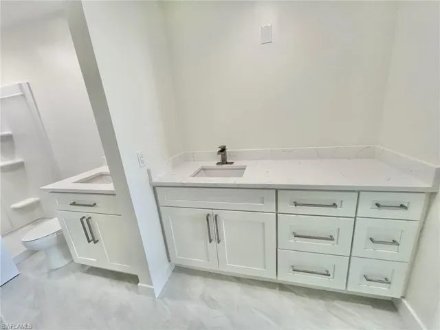 New Bathroom, 2 sinks, shower, and walk in closet.
