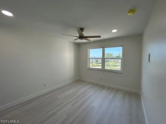 Bedroom with hurricane windows