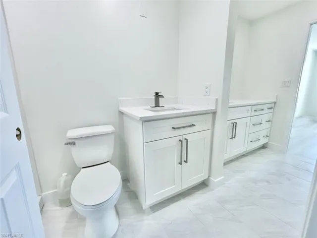 New Bathroom, 2 sinks, shower, and walk in closet.