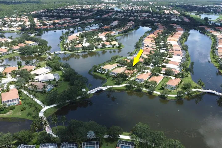 View of property location with nearby suburban area and a nearby body of water
