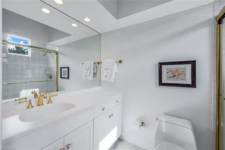 Ensuite bath with walk in shower.
