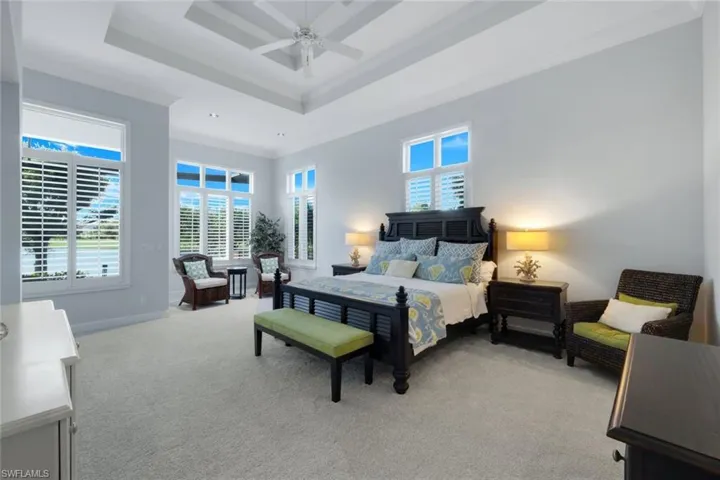The spacious primary bedroom is the perfect place to begin and to end your day.