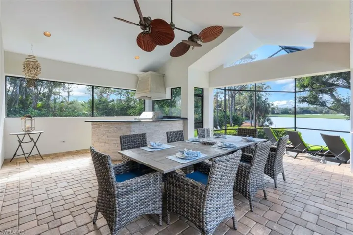 The fully equipped outdoor kitchen makes dining outdoors a breeze.