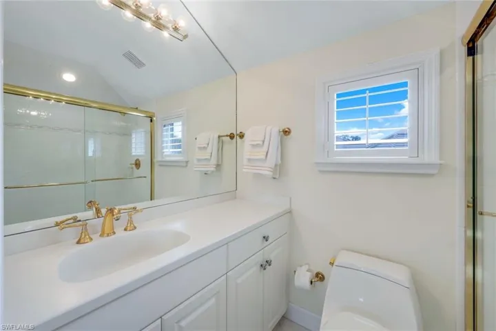 Ensuite guest bathroom on second level.