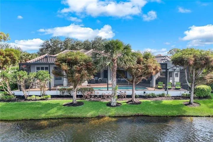 Rear view of home into the lanai/pool area.