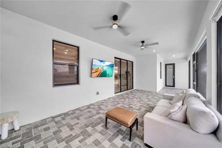 Living room featuring ceiling fan