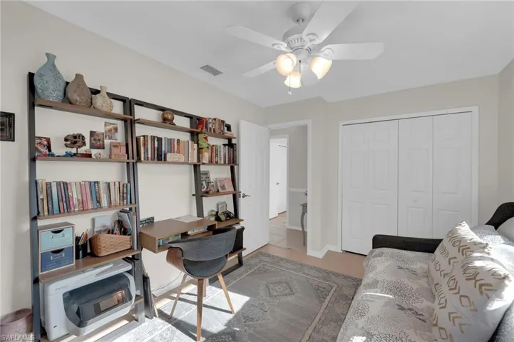 Home office featuring ceiling fan