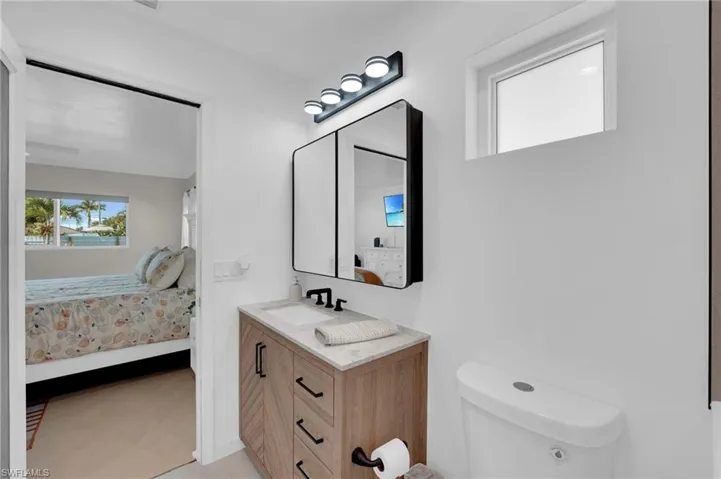 Bathroom with ensuite bathroom and vanity