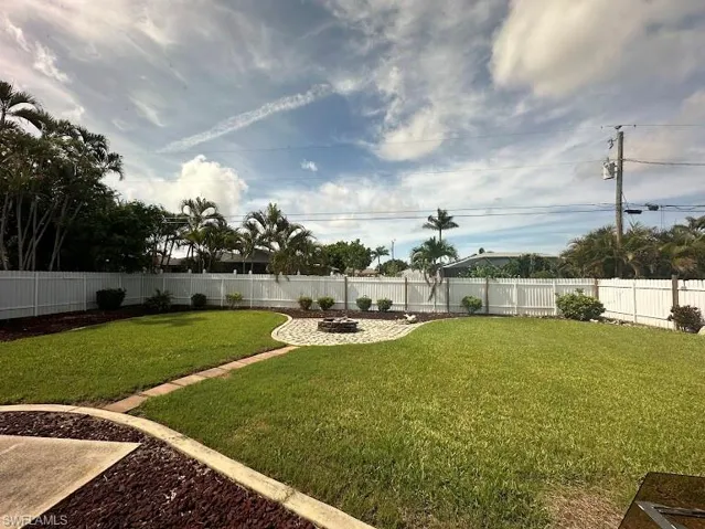 View of fenced backyard