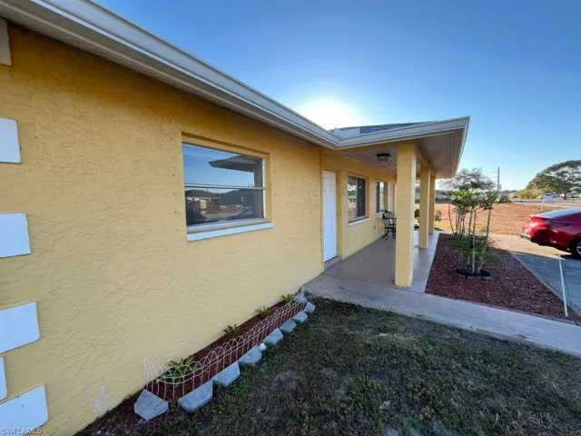 View of home's exterior with stucco siding