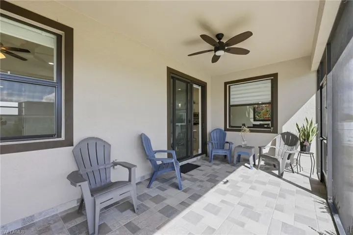 View of patio with a ceiling fan