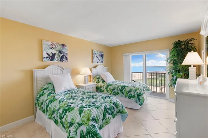 Generously Sized Guest Room with Walk in Closet and Balcony