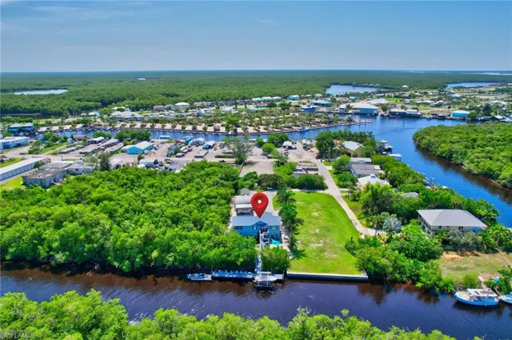 Aerial view of residential area with a nearby body of water