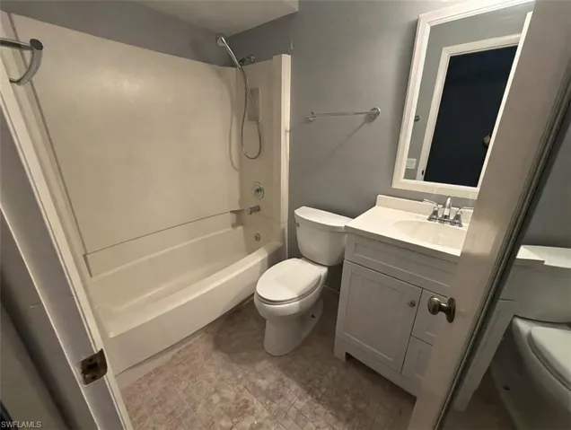 Full bathroom with bathtub / shower combination and vanity