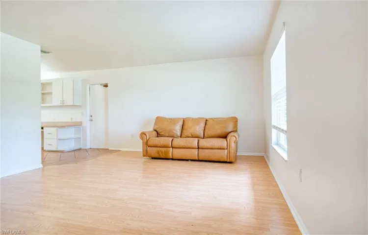 Living room with light wood-style floors