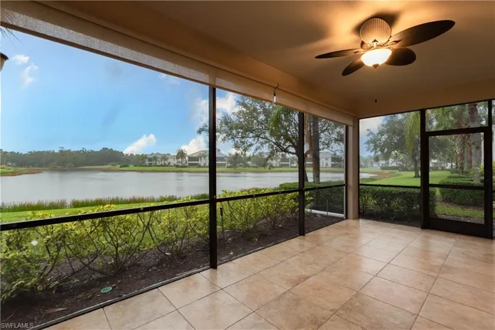 Lanai featuring a gorgeous water view....with a tiled floor