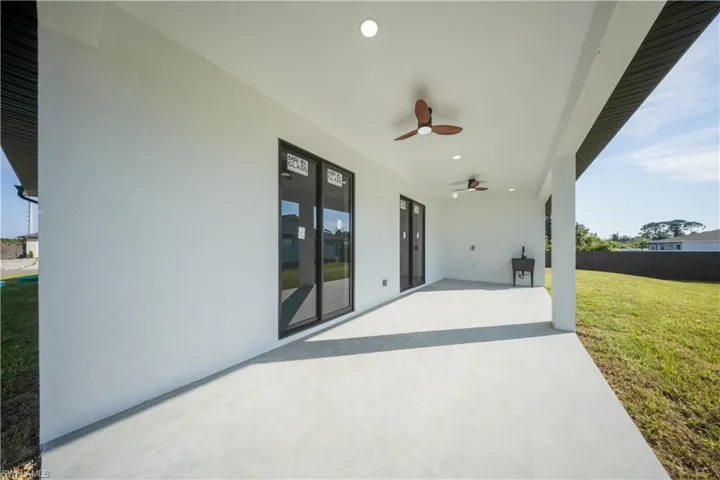 View of patio / terrace with a ceiling fan
