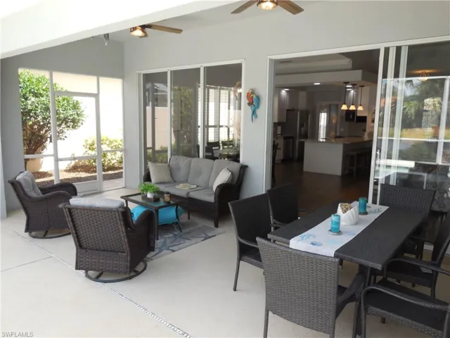 View of patio / terrace with outdoor lounge area, outdoor dining space, and a ceiling fan
