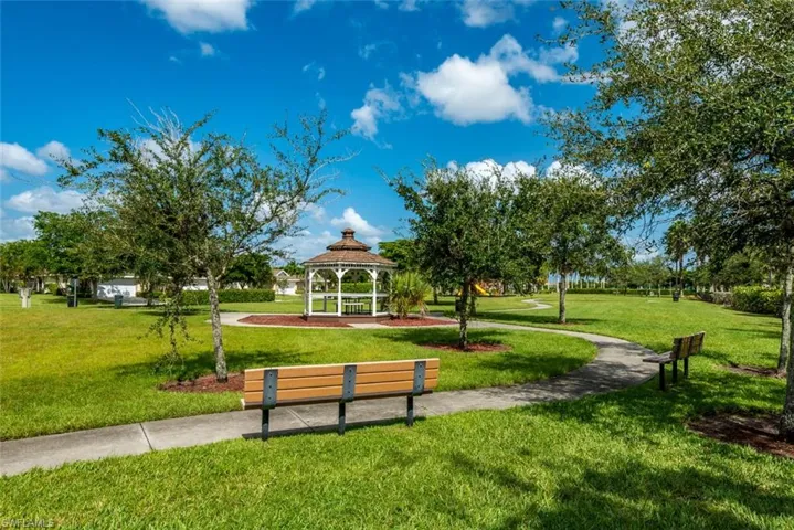 Surrounding community with a gazebo and a patio area