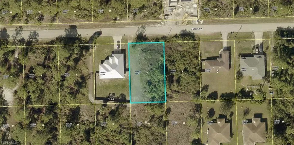 Aerial map of property and surrounding area featuring property boundaries highlighted