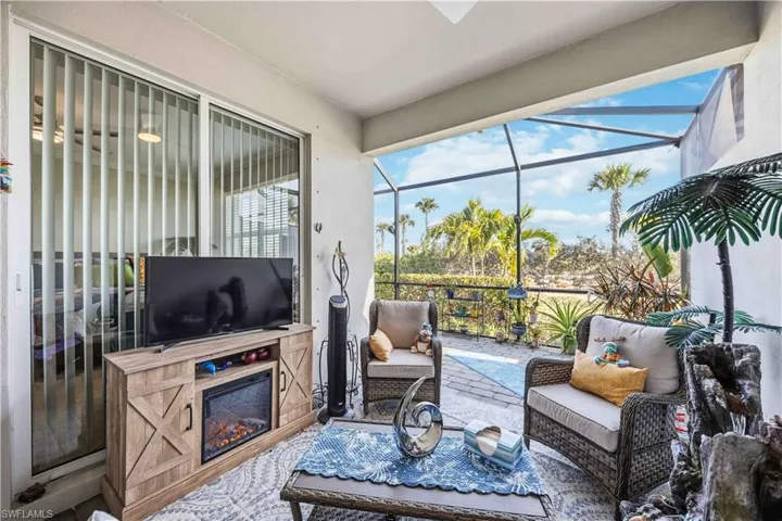 Sunroom featuring an outdoor hangout area and a patio area