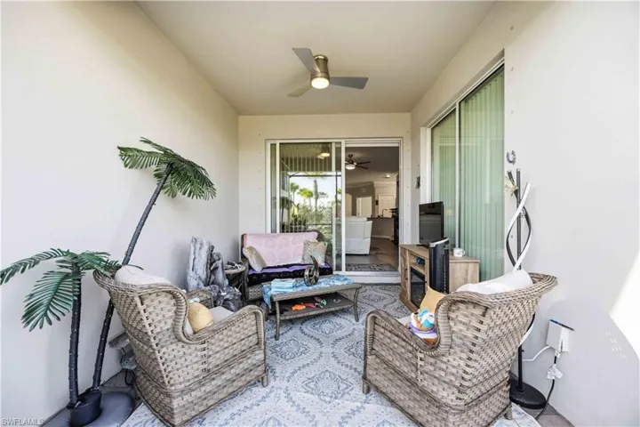 View of patio featuring ceiling fan and outdoor lounge area