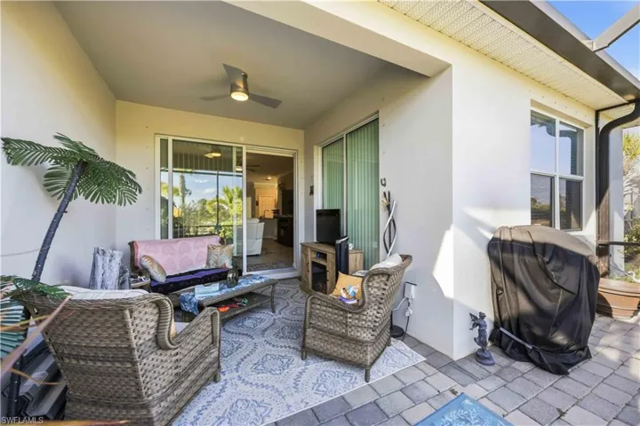 View of patio featuring ceiling fan and an outdoor lounge area