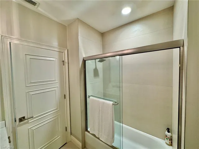 Bathroom with shower with separate bathtub