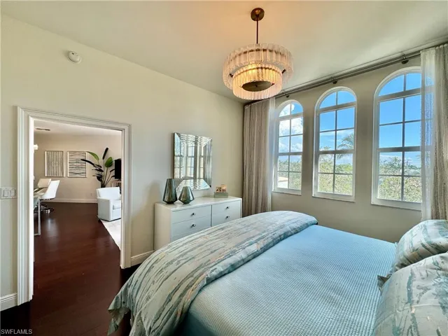 Bedroom featuring dark hardwood / wood-style floors