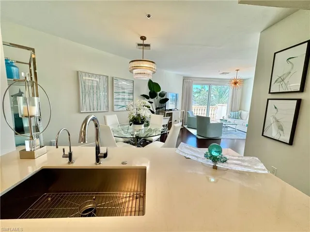 Kitchen with sink and hanging light fixtures