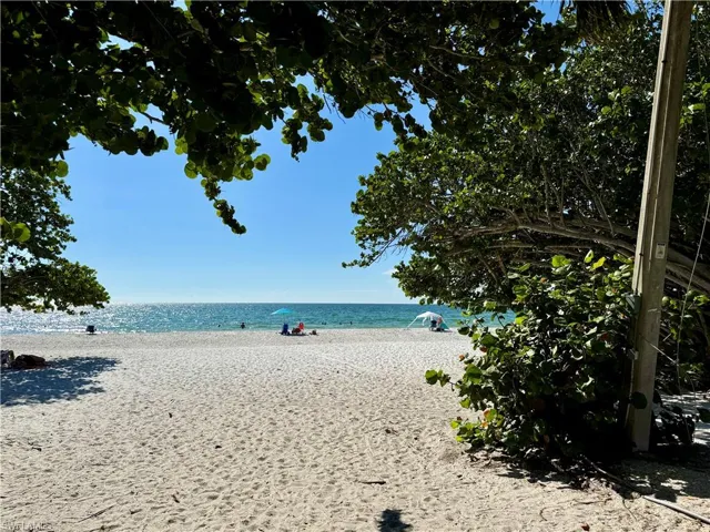 Property view of water with a view of the beach