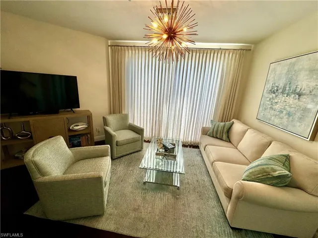 Living room with an inviting chandelier