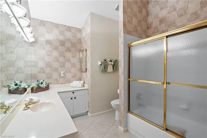 Vanity with an integrated sink and base cabinetry