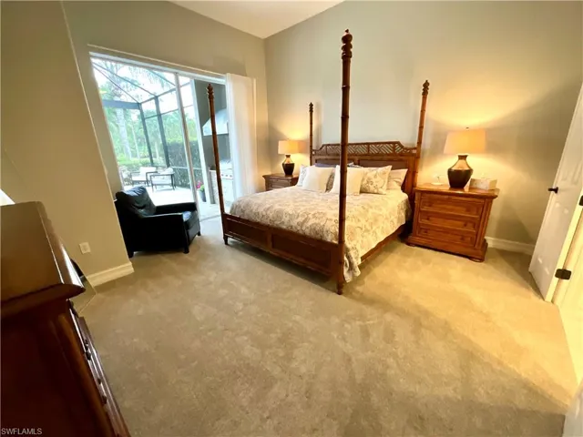 Master Bedroom featuring access to patio