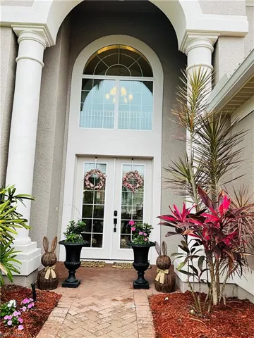 Property entrance with french doors
