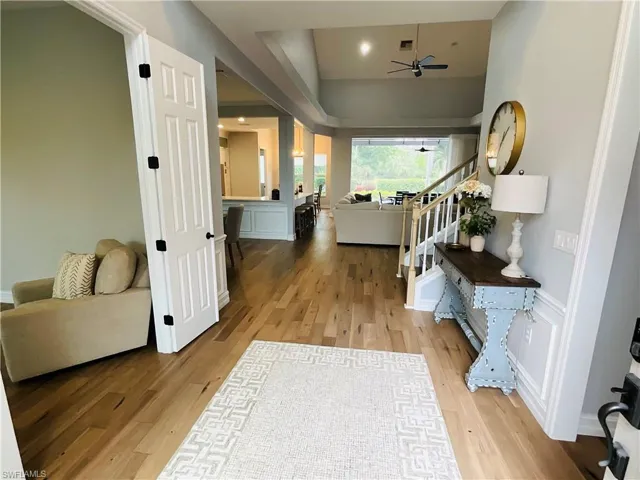 Grand foyer entry with beautiful upgraded white oak flooring