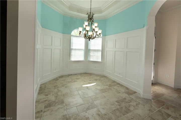 Formal Dining Room with wainscoting