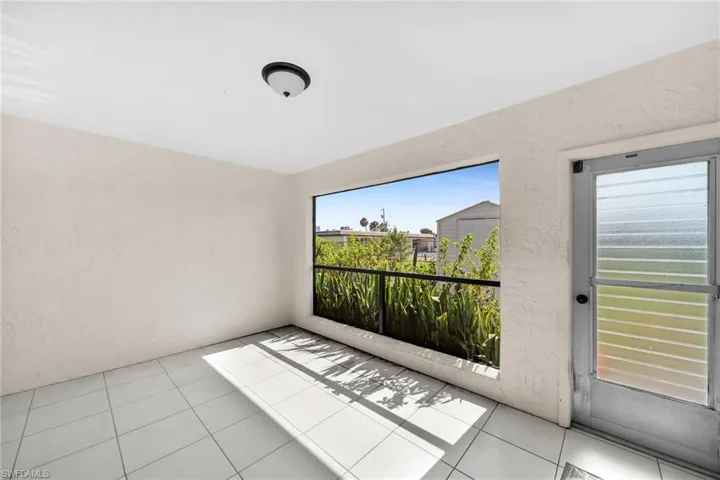 View of tiled spare room