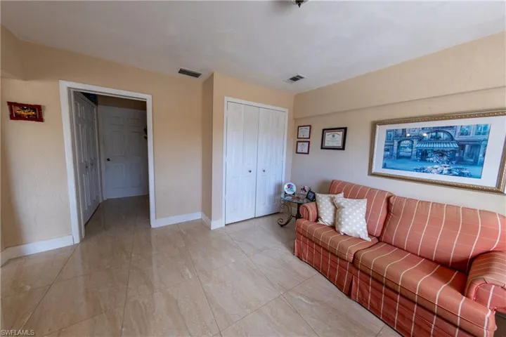 Living area featuring baseboards