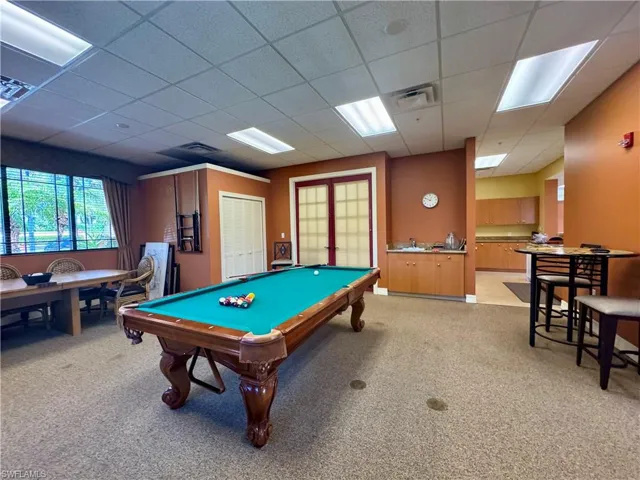 Playroom with visible vents, light colored carpet, and billiards