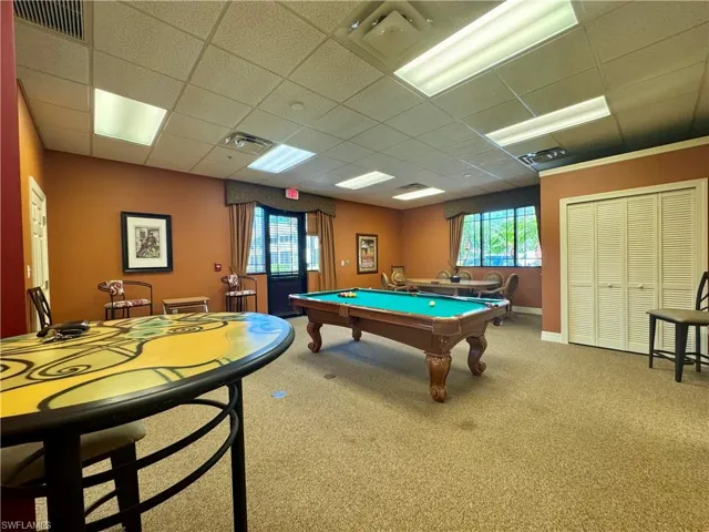 Game room featuring visible vents, carpet flooring, pool table, and a healthy amount of sunlight