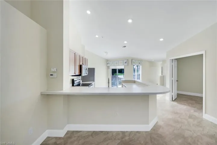 Kitchen with breakfast bar.