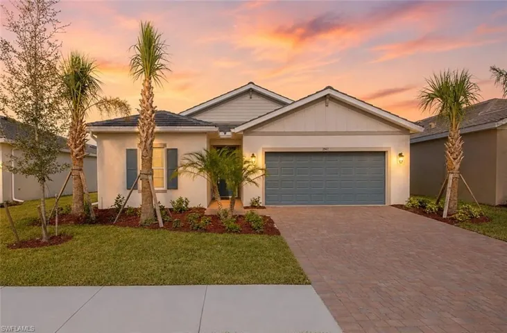 Contemporary exterior with a covered entry, decorative shutters, and an attached garage