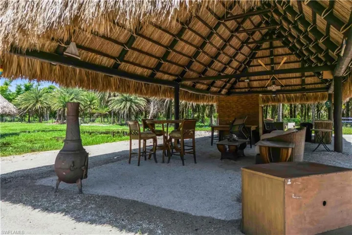 Relax under your private tiki hut—perfect for outdoor gatherings and sunset views.